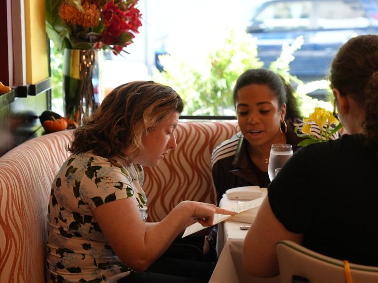 Guest Talking at Brunch