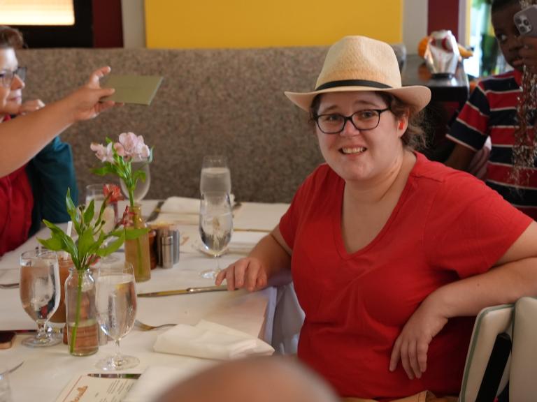 A Guest Smiling for the Camera 