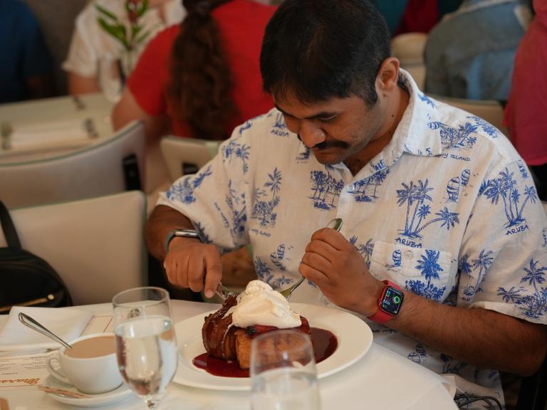 A Guest Eating Their French Toast