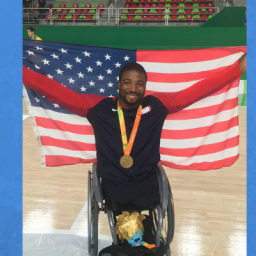 Image of Trevon Jenifer. Gold medalist Trevon Jenifer #16 of Team United States celebrates after the men’s Wheelchair Basketball medal ceremony on day. 