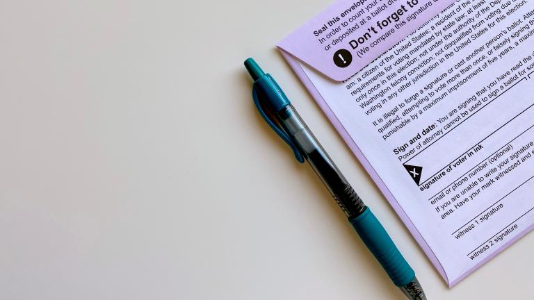 Image Description: Voter ballot and blue pen.