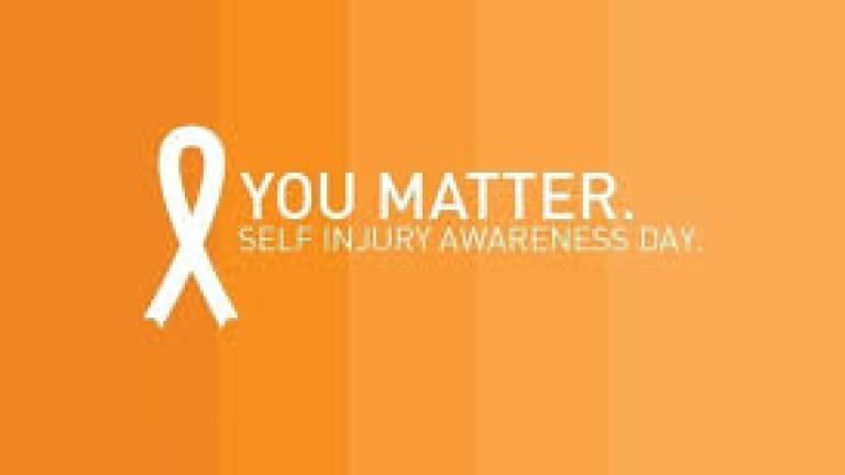 Image of a gradient orange sign with the words &quot;YOU MATTER SELF INJURY AWARENESS DAY&quot; and a white ribbon.