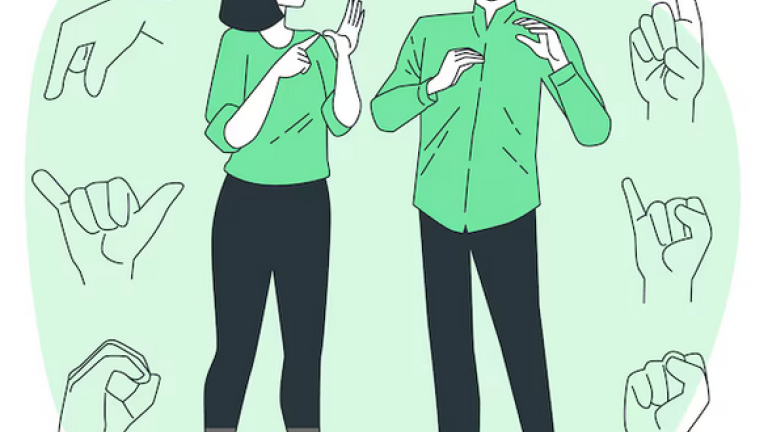 Two people talking in sign language