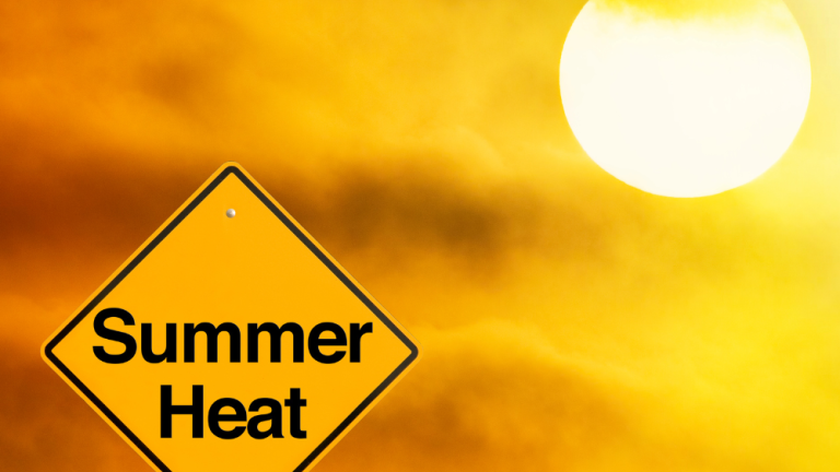 a caution sign that says summer heat in front of a orange and yellow background