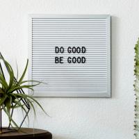 A white board reads: "Do Good, Be Good."